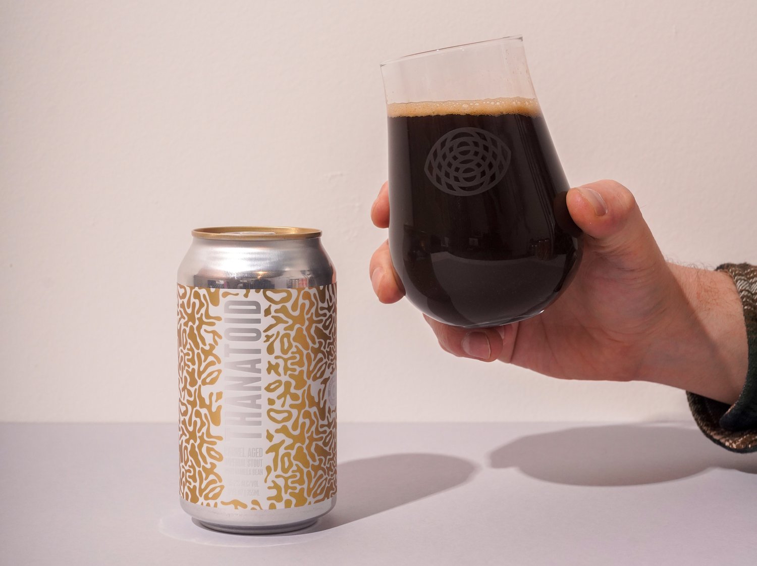 Our Mutual Friend Brewing Announces Bourbon Barrel-Aged Stout and Rotating IPA series This Month 8 Thanatoid Can Glass Horizontal