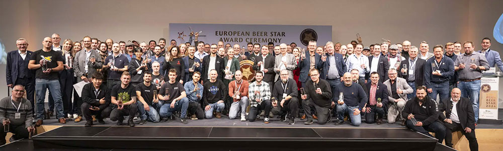 American Craft Brewers Claim Top Honors in European Beer Competitions 14 european-beer-star-winners-posed-together-on-stage