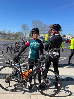 Dogfish Head's Beer & Benevolence Program Makes an Impactful Splash in 2022 16 Two bikers with Dogfish apparel