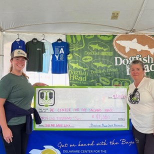Dogfish Head's Beer & Benevolence Program Makes an Impactful Splash in 2022 18 Large check donation at Dogfish Dash