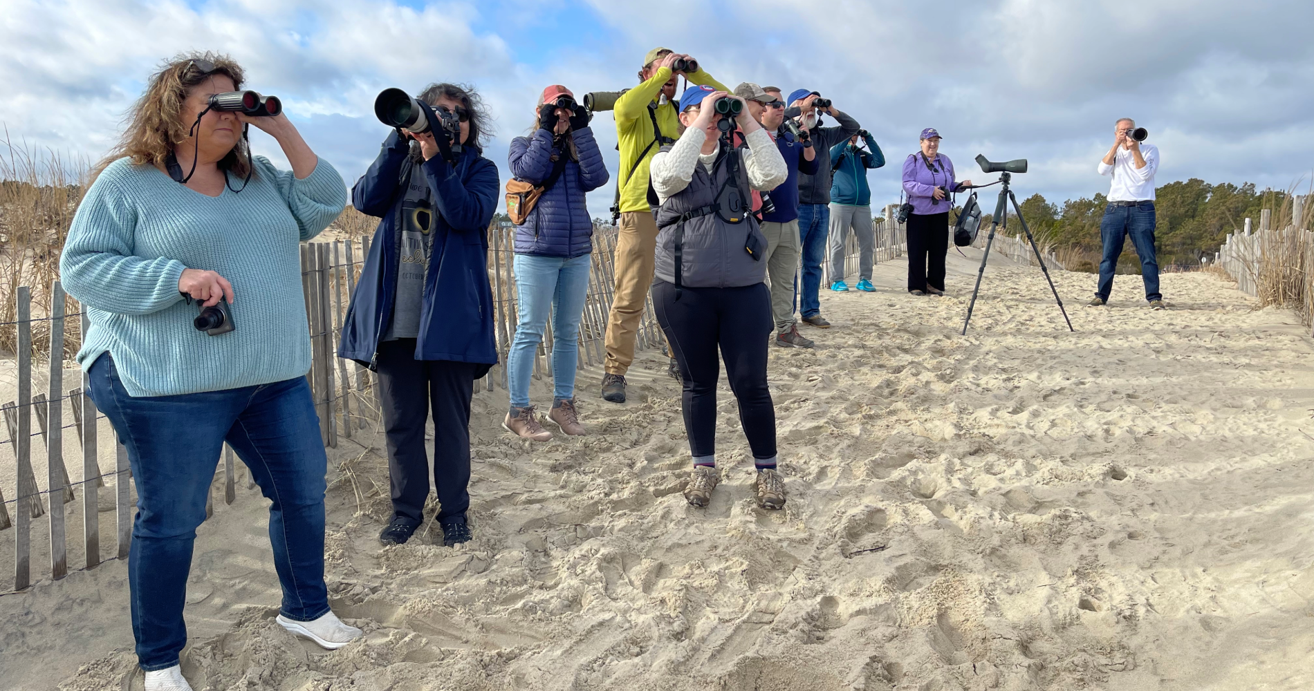 Dogfish Head: Sandpipers, Seals and Scoters…Oh My! Delmarva BirdINNg Weekends Are Here! 13 A group of people birding on the beach