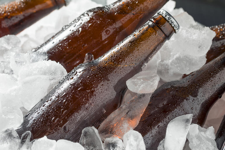 Cold, icy drink bottles in ice Cold, icy drink bottles in ice