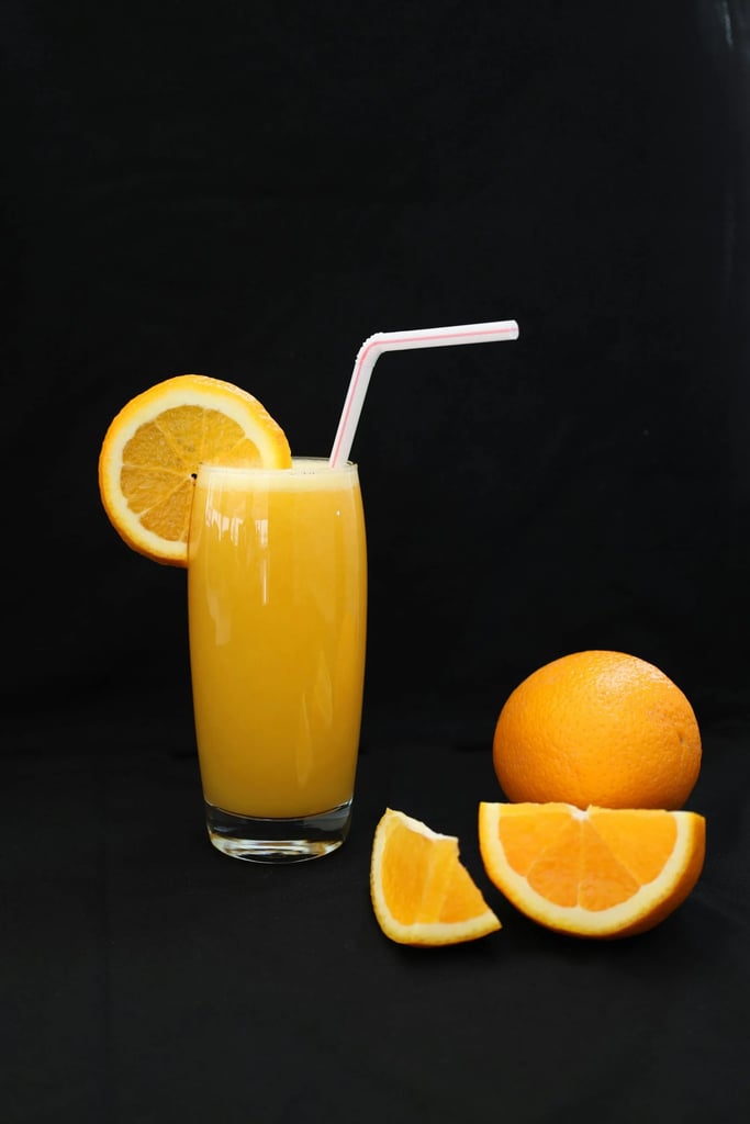 A lunchbox beer cocktail made with beer and orange juice.