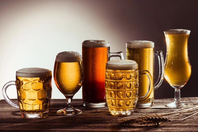 Assortment of beer styles in different glasses, illustrating how to choose the perfect brew for any occasion.