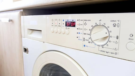 Miele washing machine control panel displaying an error code on its digital screen.