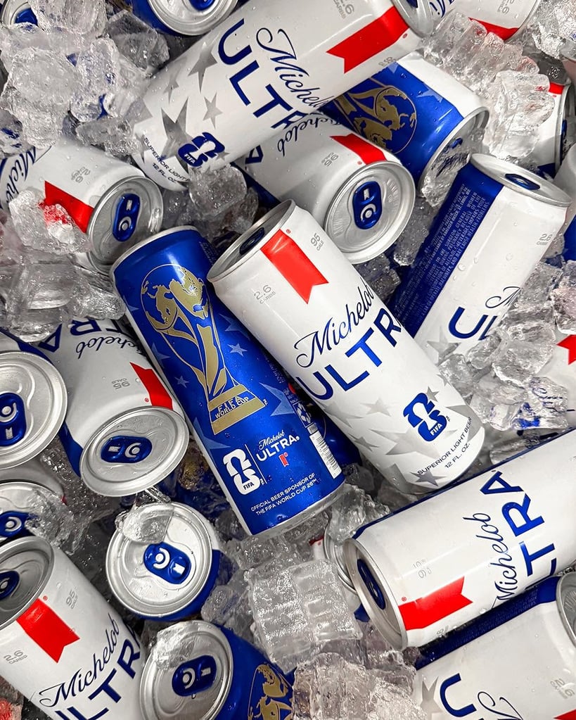 What Are Domestic Beers? Popular American Brands Explained 13 Cans of Michelob Ultra in a cooler of ice