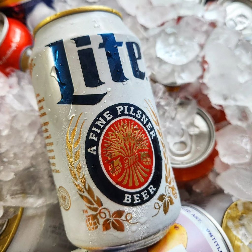 What Are Domestic Beers? Popular American Brands Explained 11 Can of Miller Lite on ice